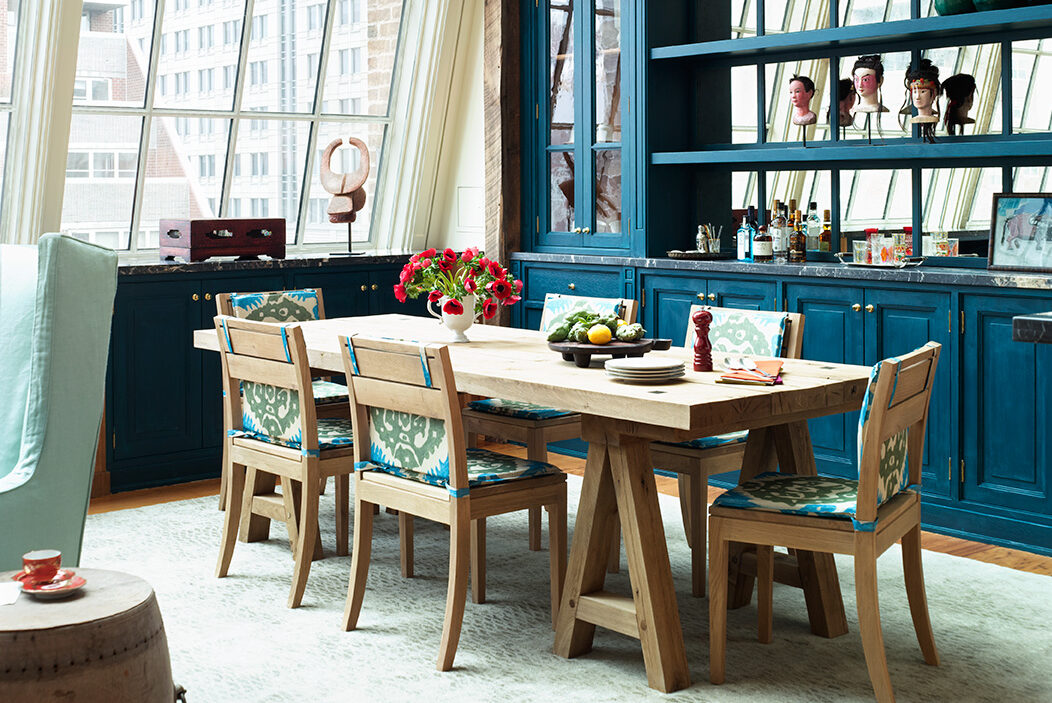 Dining area and large window in the Greenwich Penthouse at The Greenwich Hotel