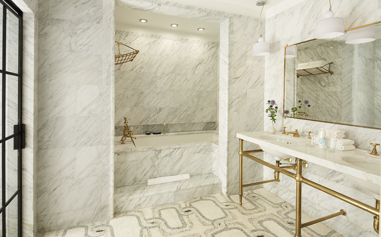 View of the tub, sink and shower in 1 Bedroom Corner suite