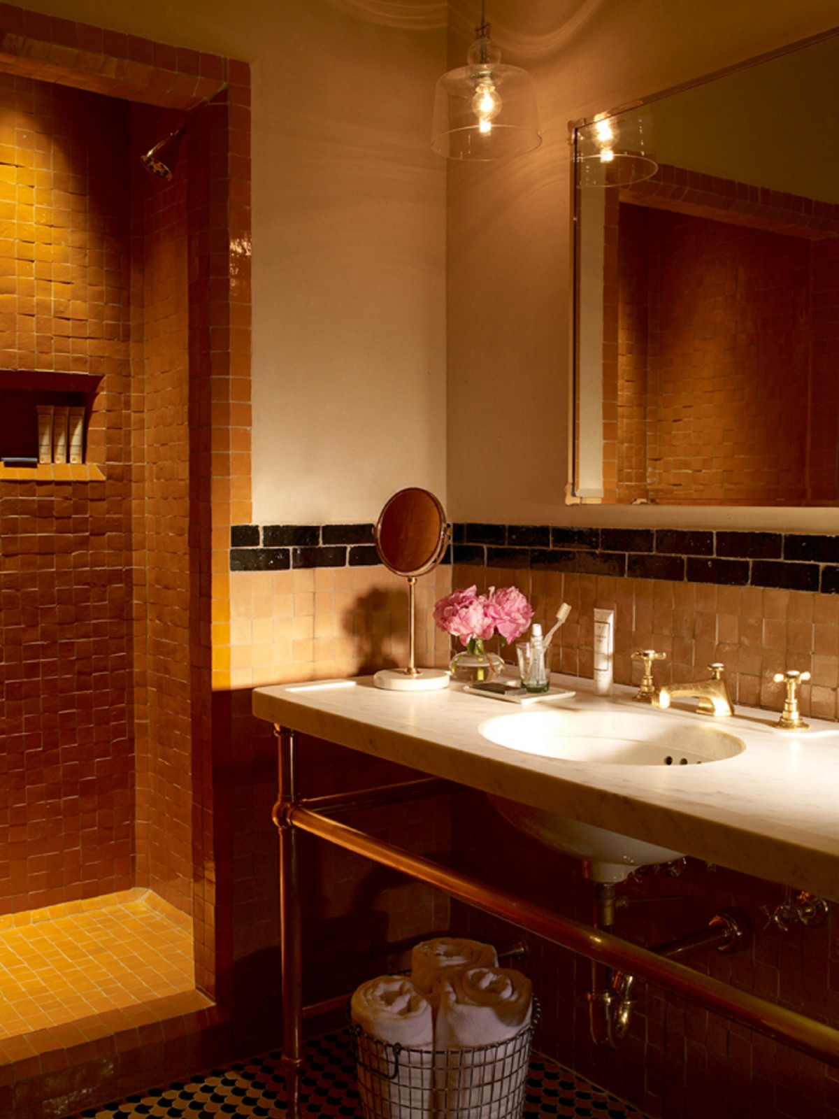 View of the shower and sink in the Deluxe King room