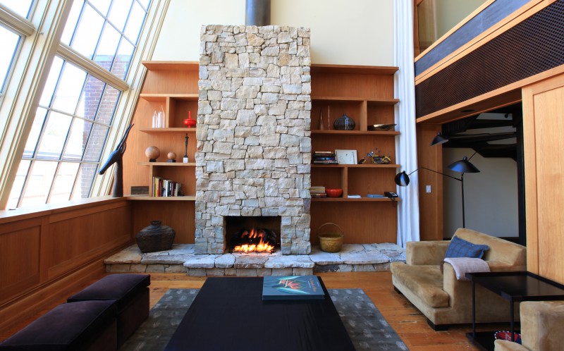 Fireplace and Dining Room view inside the N. Moore Penthouse