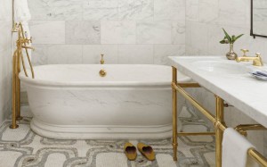 Detail of the tub, sink, and tile in the bathroom
