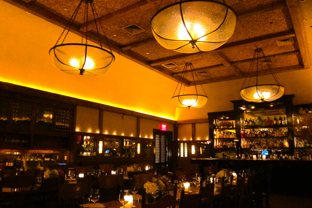 View of the dining room and bar at Locanda Verde located in The Greenwich Hotel