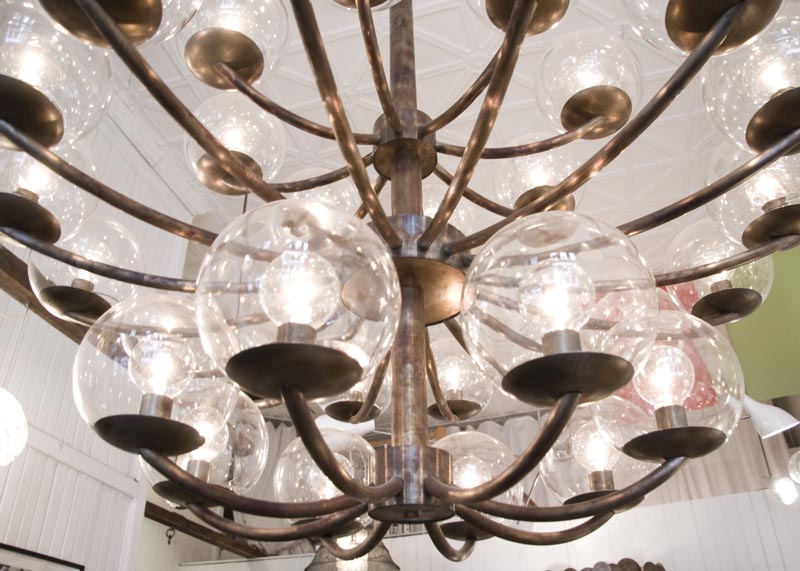 Detail of a glass globes on a chandelier at trans.LUXE