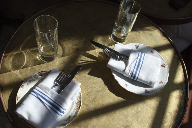 Overhead view of a table setting Tiny's and the Bar Upstairs