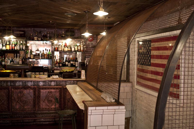 The bar and stairway at Tiny's and the Bar Upstairs