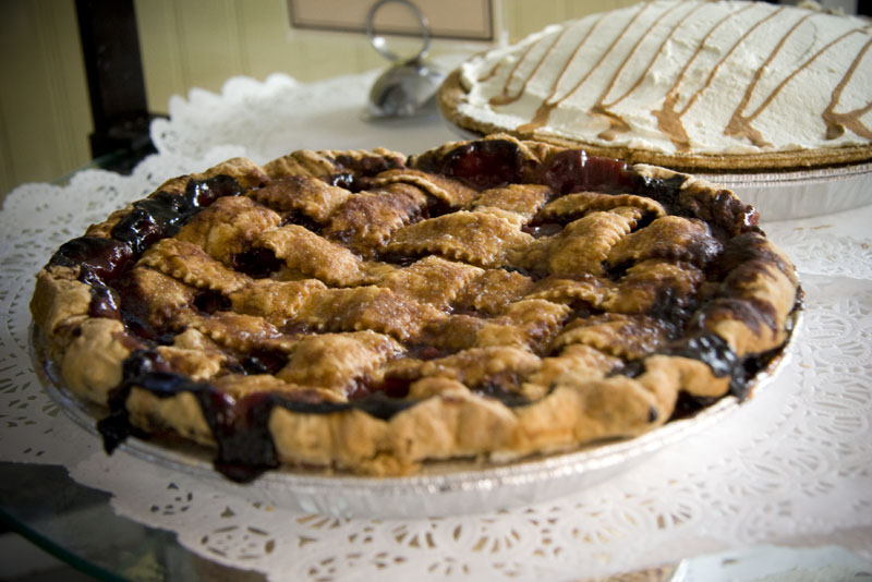 Two pies on display inside Bubby's Pie Company