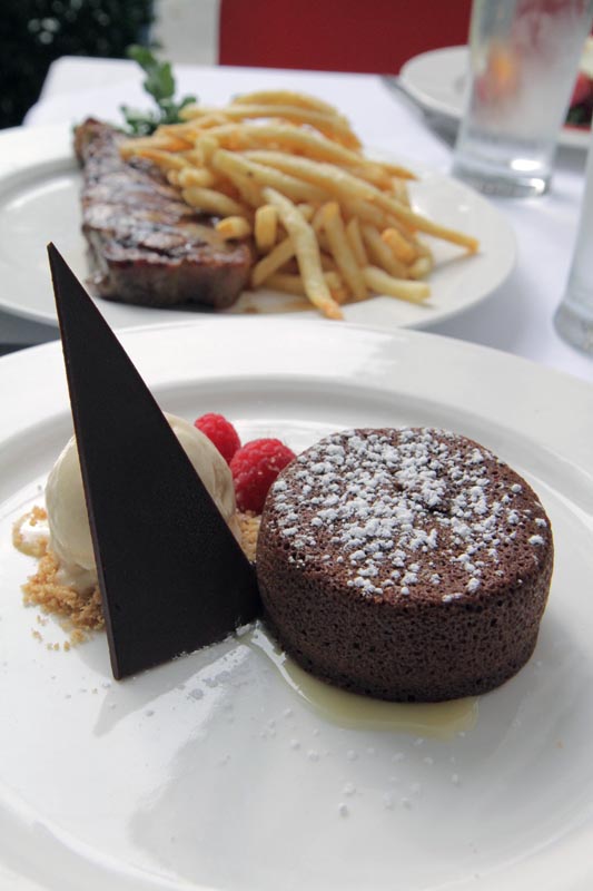 Dessert plate and steak frites at The Odeon