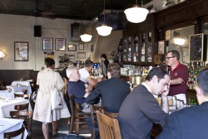 Customers line the bar at Walker's