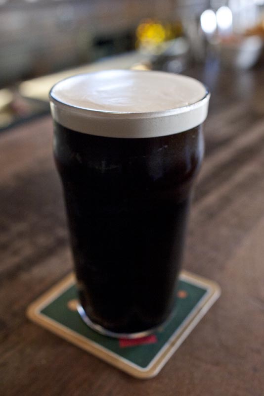 A stout on the bar at Walker's