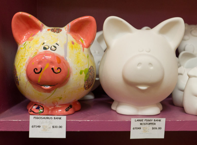 Piggie Banks on display at Color Me Mine located close to The Greenwich Hotel