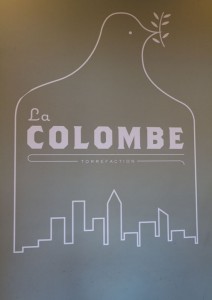 La Colombe logo featuring the New York City skyline located close to The Greenwich Hotel