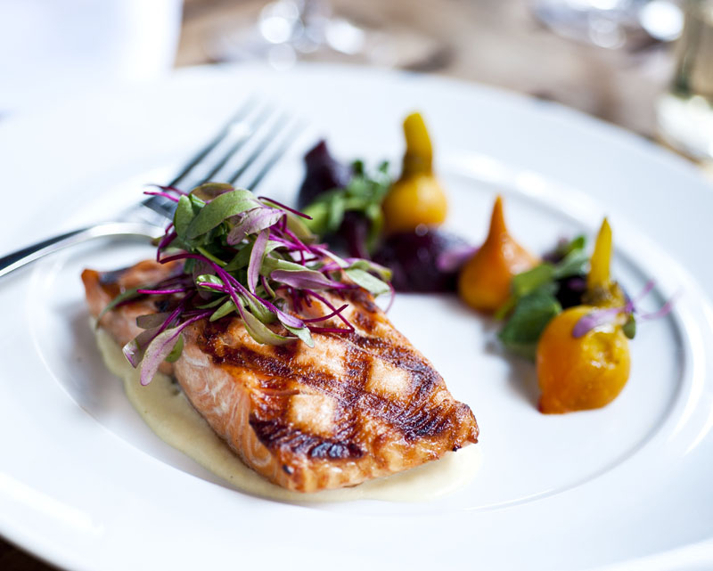 Grilled Atlantic Salmon dish at The Tribeca Grill located close to The Greenwich Hotel