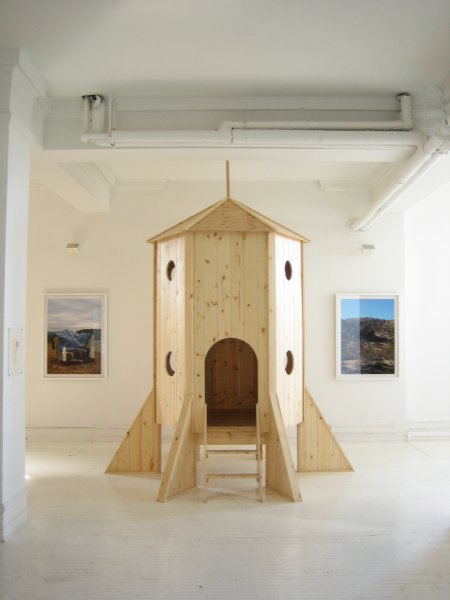 Wooden rocket structure on display in Clocktower Gallery