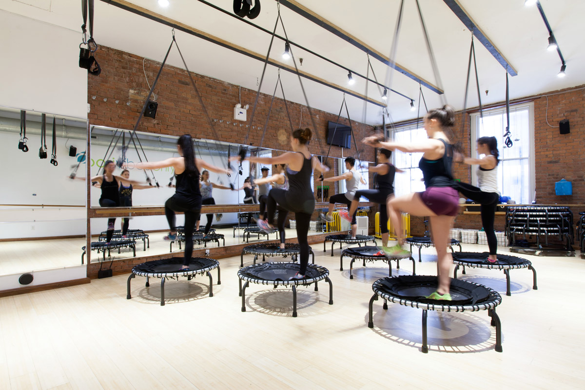 A trampoline workout class in session at Bari Studio