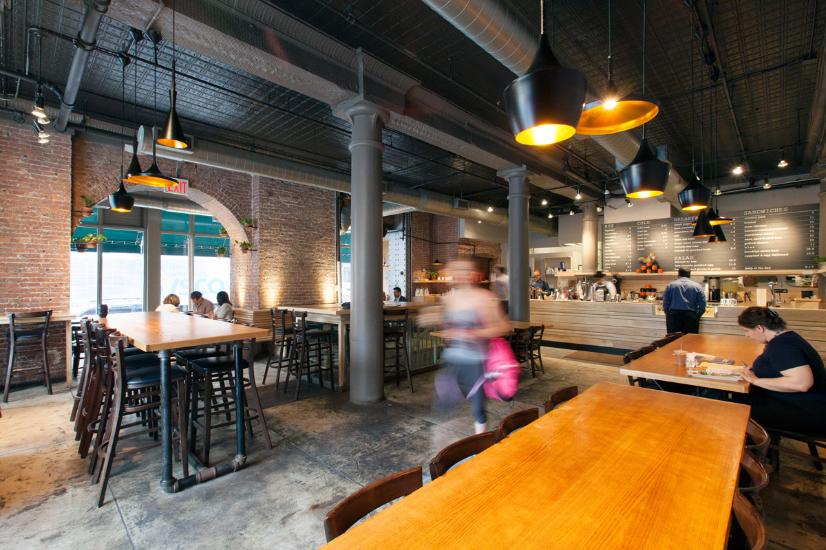 A customer moves quickly through the Gotan seating area