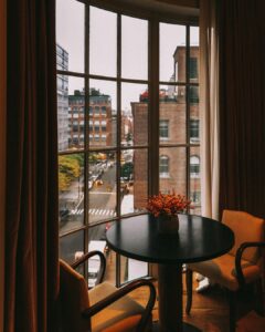 Looking out of the window of a corner suite at The Greenwich Hotel