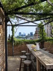 Another table with stools outside on the terrace
