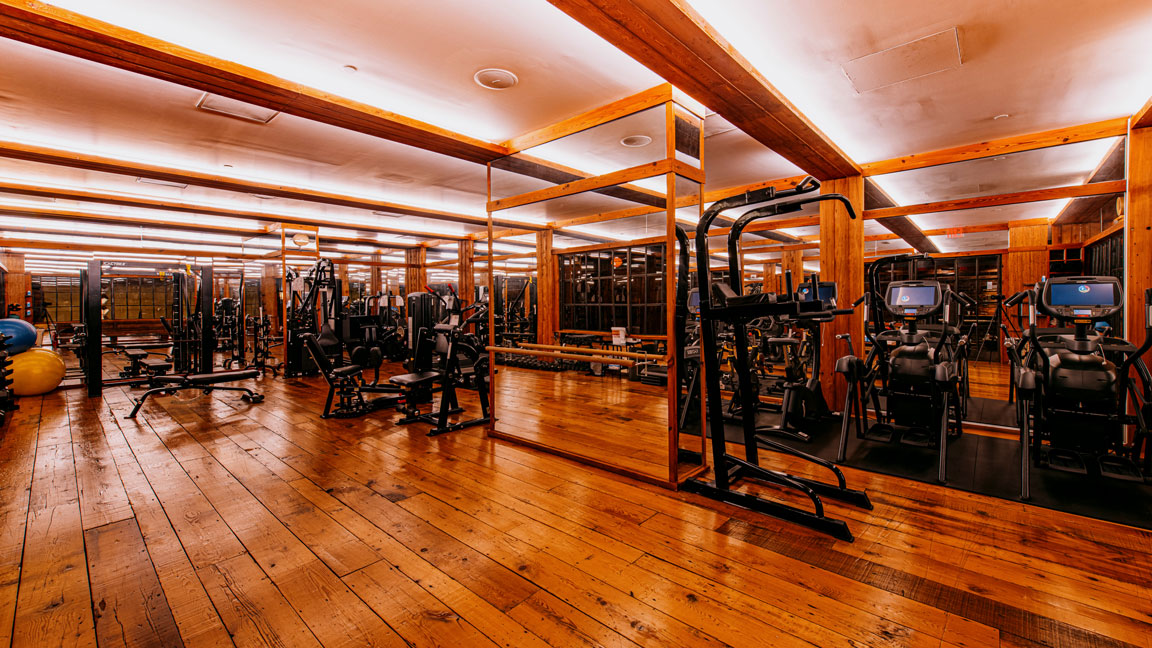 Wide shot of the gym with equipment