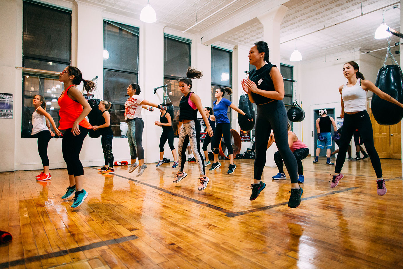 Students jumping in a training class