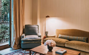 Courtyard Suite Living a view of the sitting area and balcony