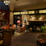 The fireplace seating area in the Drawing Room at The Greenwich Hotel, a short trip from the Financial District