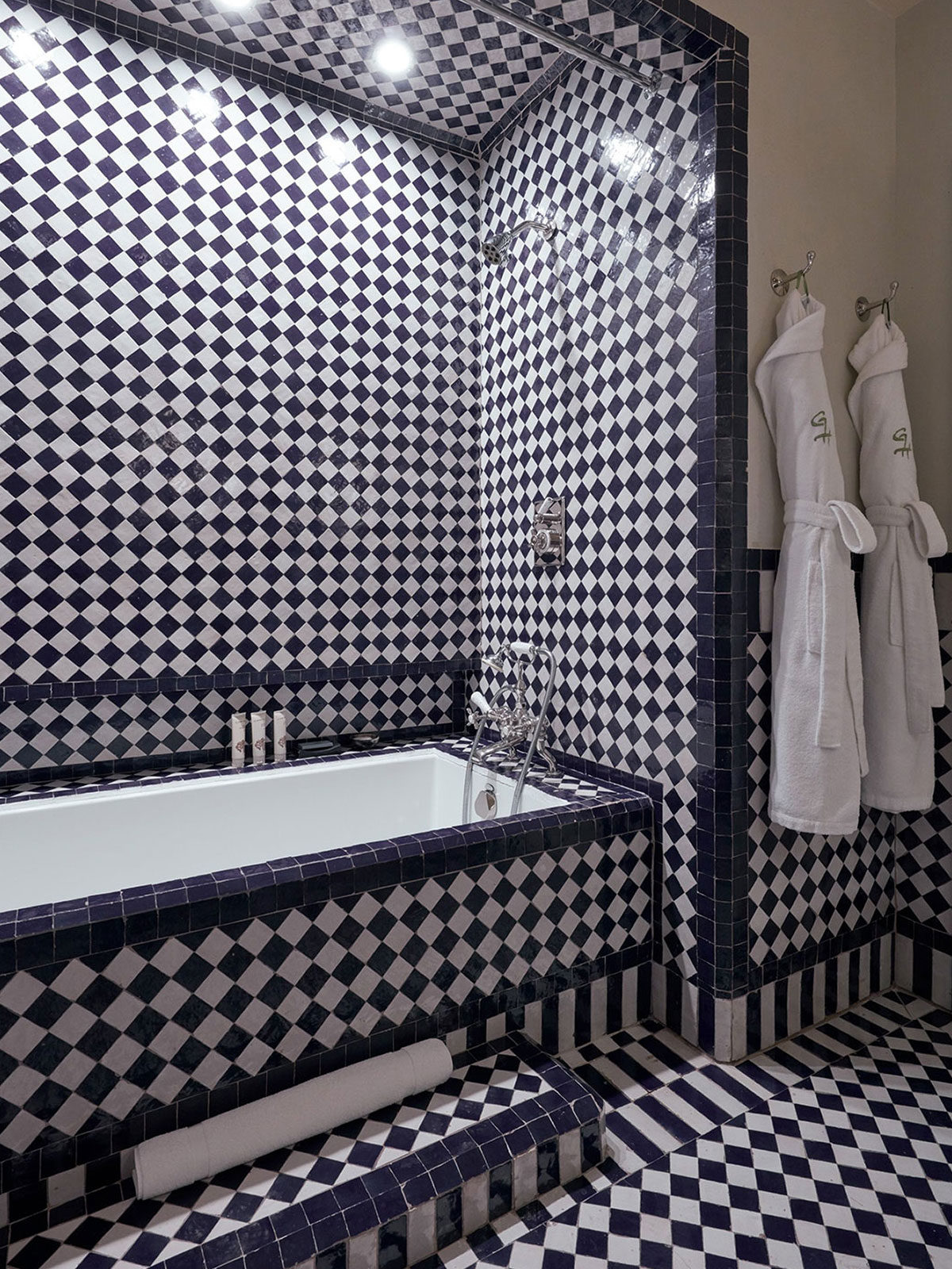 The Greenwich Hotel - Courtyard Queen Room with Soaking Tub - Blue and White Tile bathroom