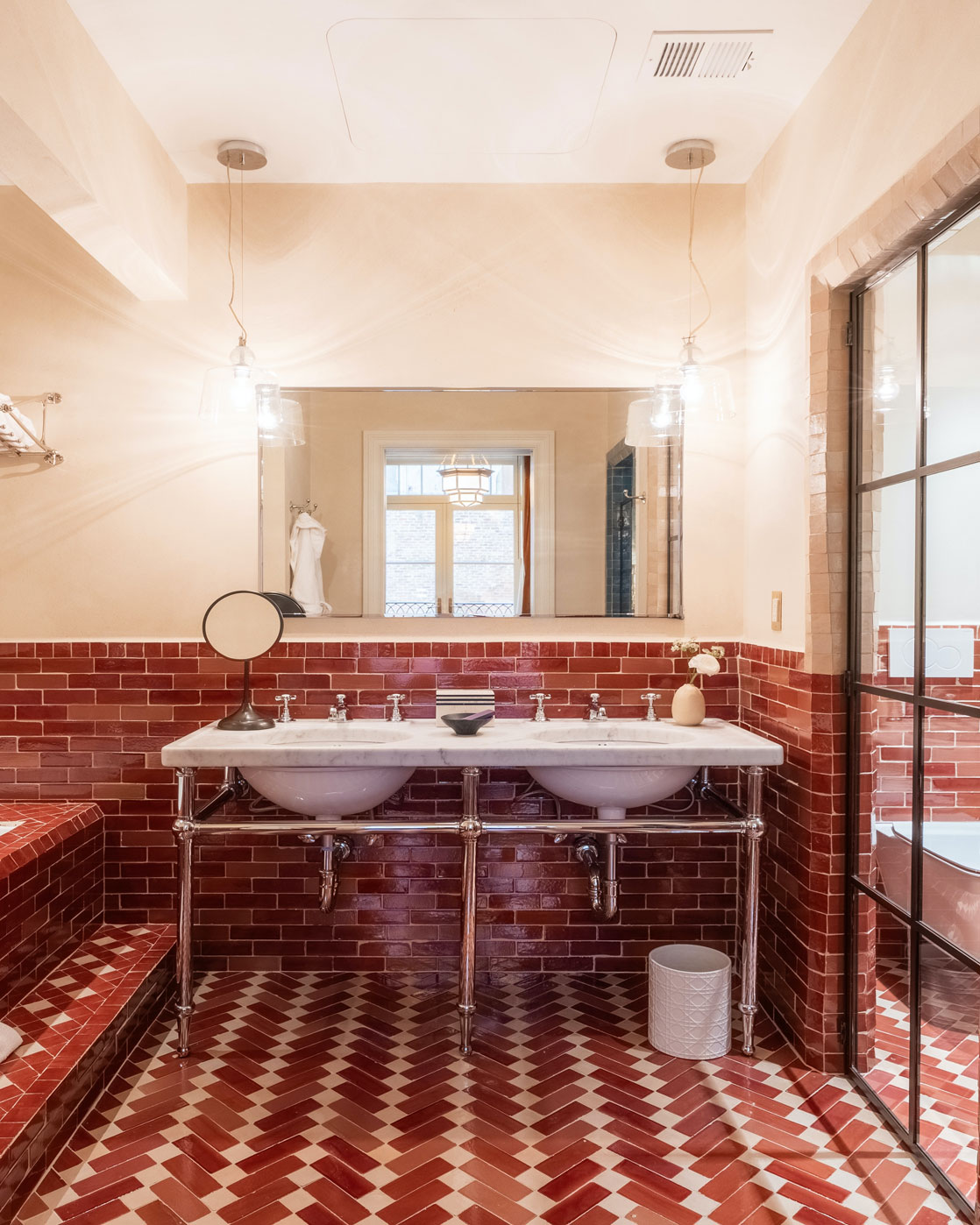 Portrait view of the bathroom with a double sink