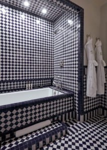 The Greenwich Hotel - Courtyard Queen Room with Soaking Tub - Blue and White Tile bathroom