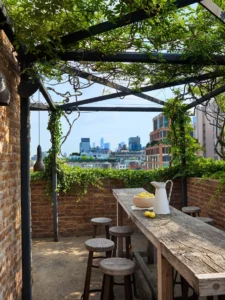 Another table with stools outside on the terrace