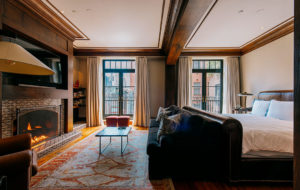 The N. Moore Penthouse bedroom with working fireplace