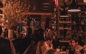 Busy dining room inside Locanda Verde