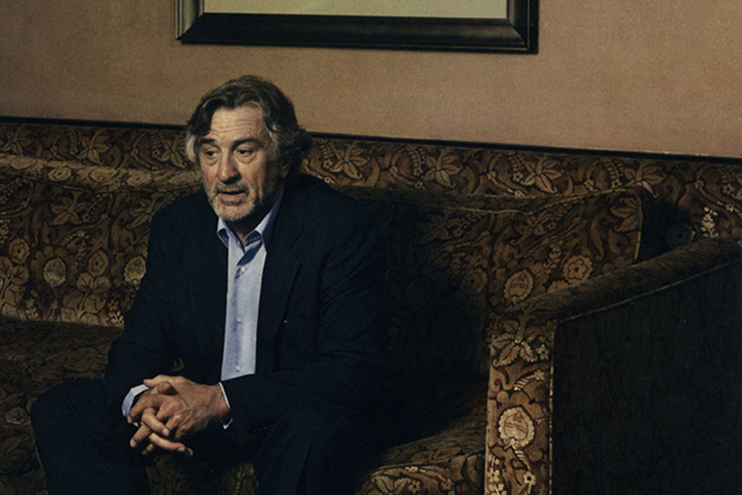 Robert De Niro sitting in the Drawing Room at The Greenwich Hotel. Photo by Karen Collins courtesy of Wallpaper Magazine