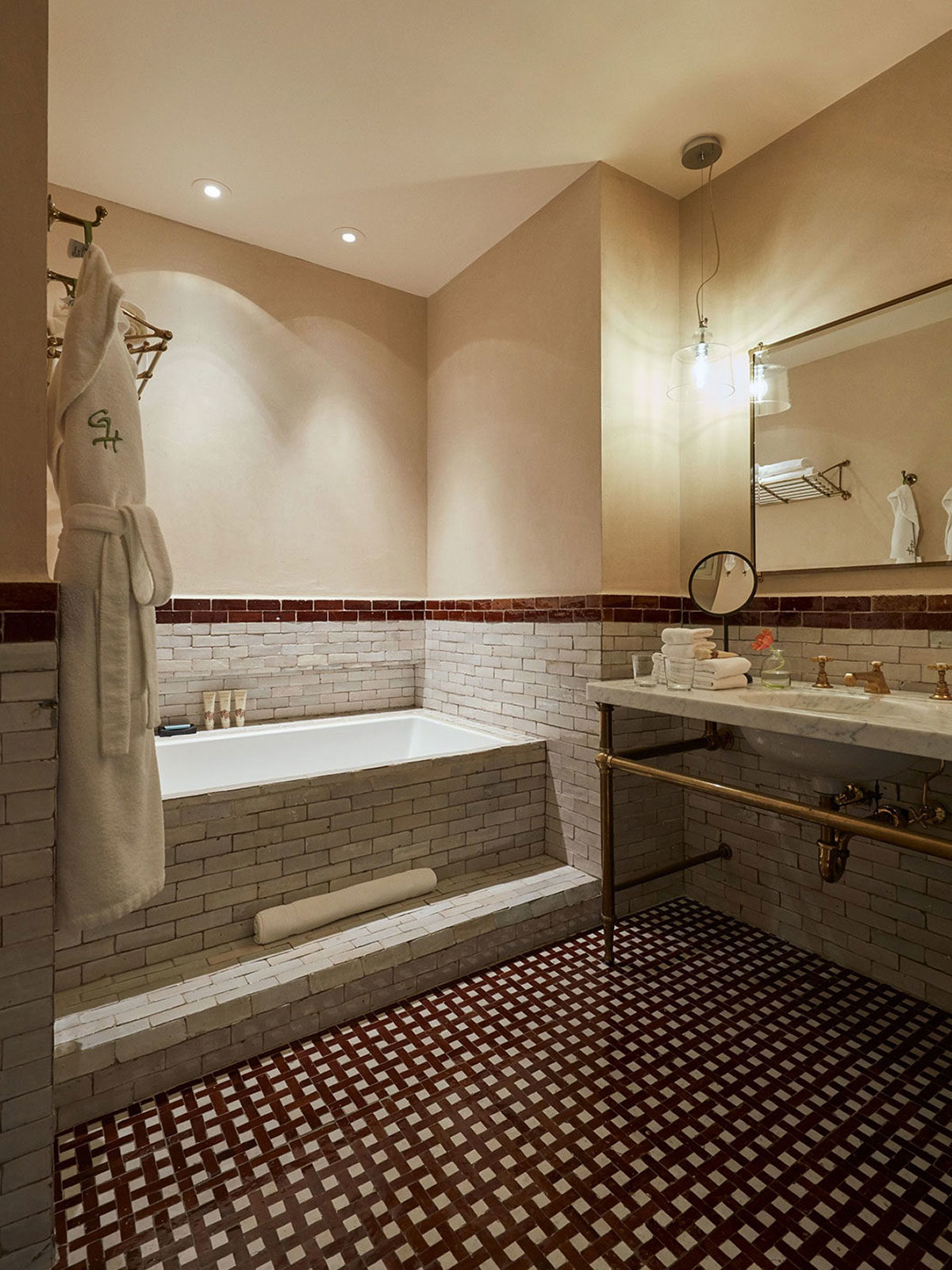 Bathroom with Red and White Tile at The Greenwich Hotel