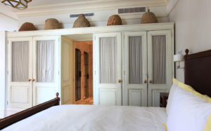 View of the bed and closets in the 2 Bedroom Fireplace suite