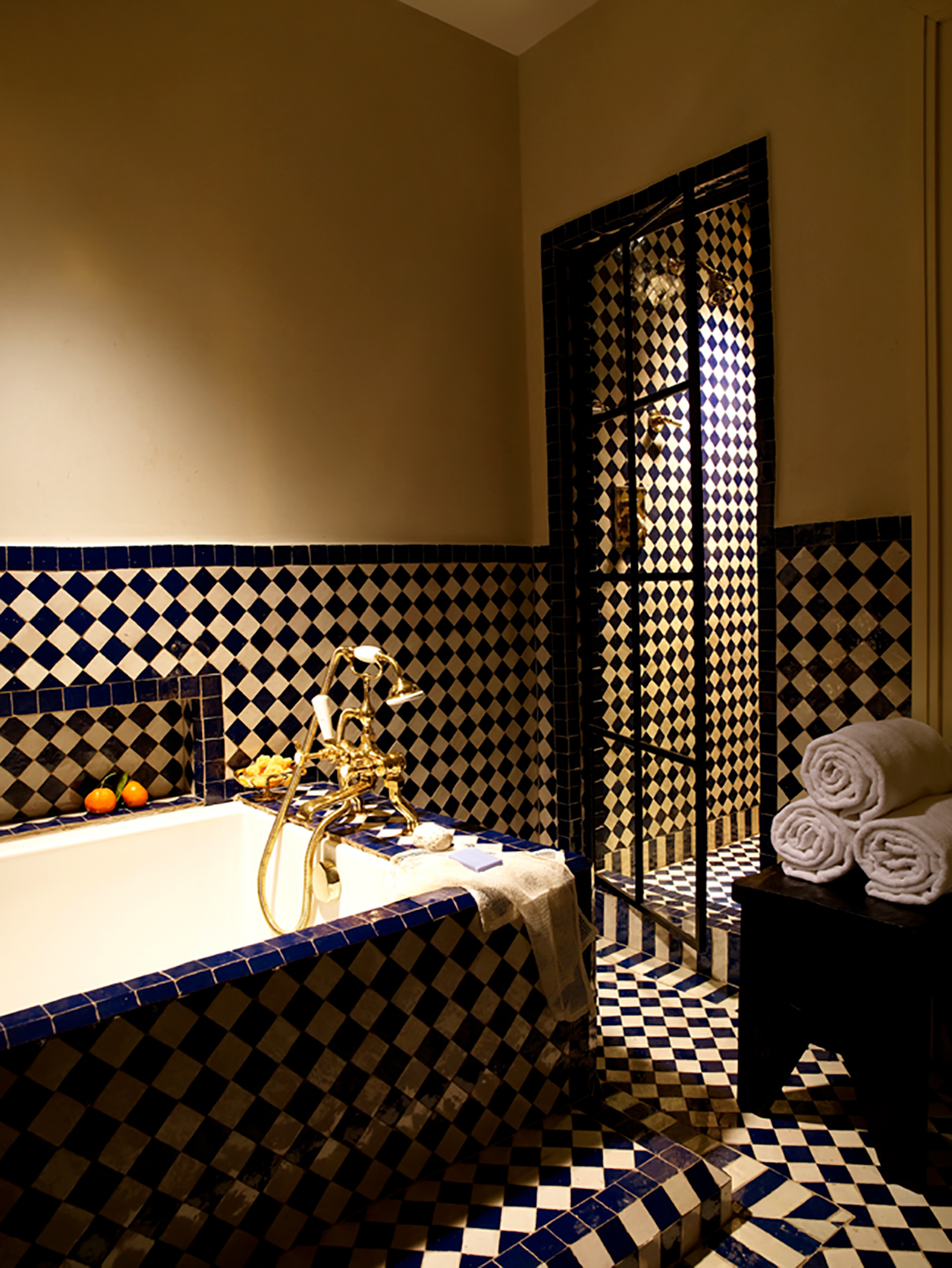 The Greenwich Hotel - Blue Moroccan Tile Bathroom and Soaking Tub