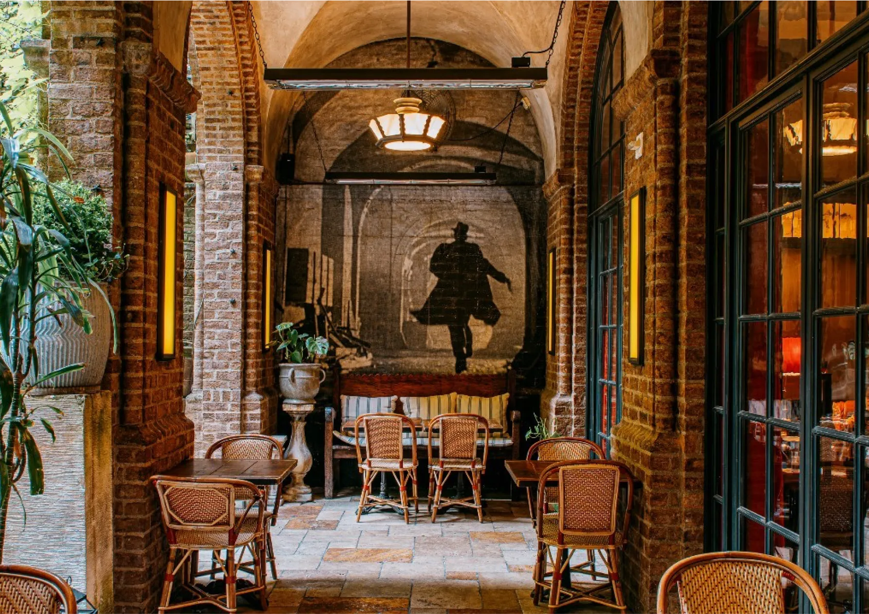 Looking at the mural on the back wall inside the Colonnade at the Greenwich hotel